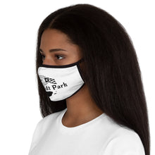 Load image into Gallery viewer, side view humboldt park chicago paseo boricua puerto rico puerto rican hoodie puerto rican flag humboldt park lagoon chicago neighborhood chicago hoodies fitted face mask streetwear white mask black letters female model

